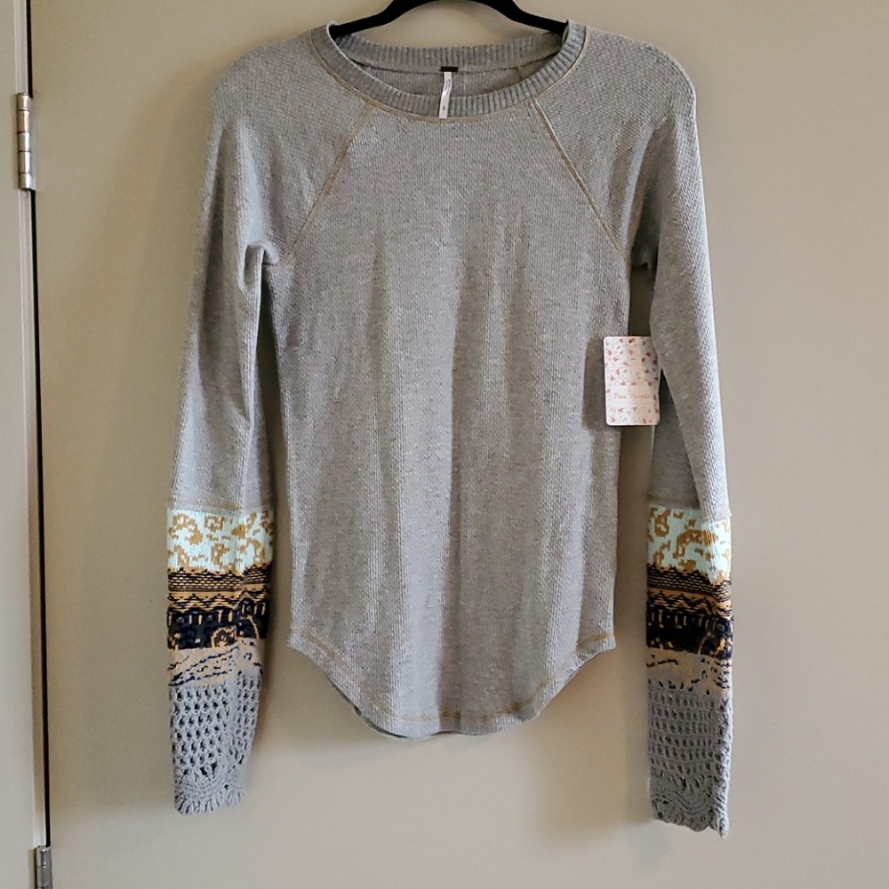 Free people long sleeve top. NWT size M.